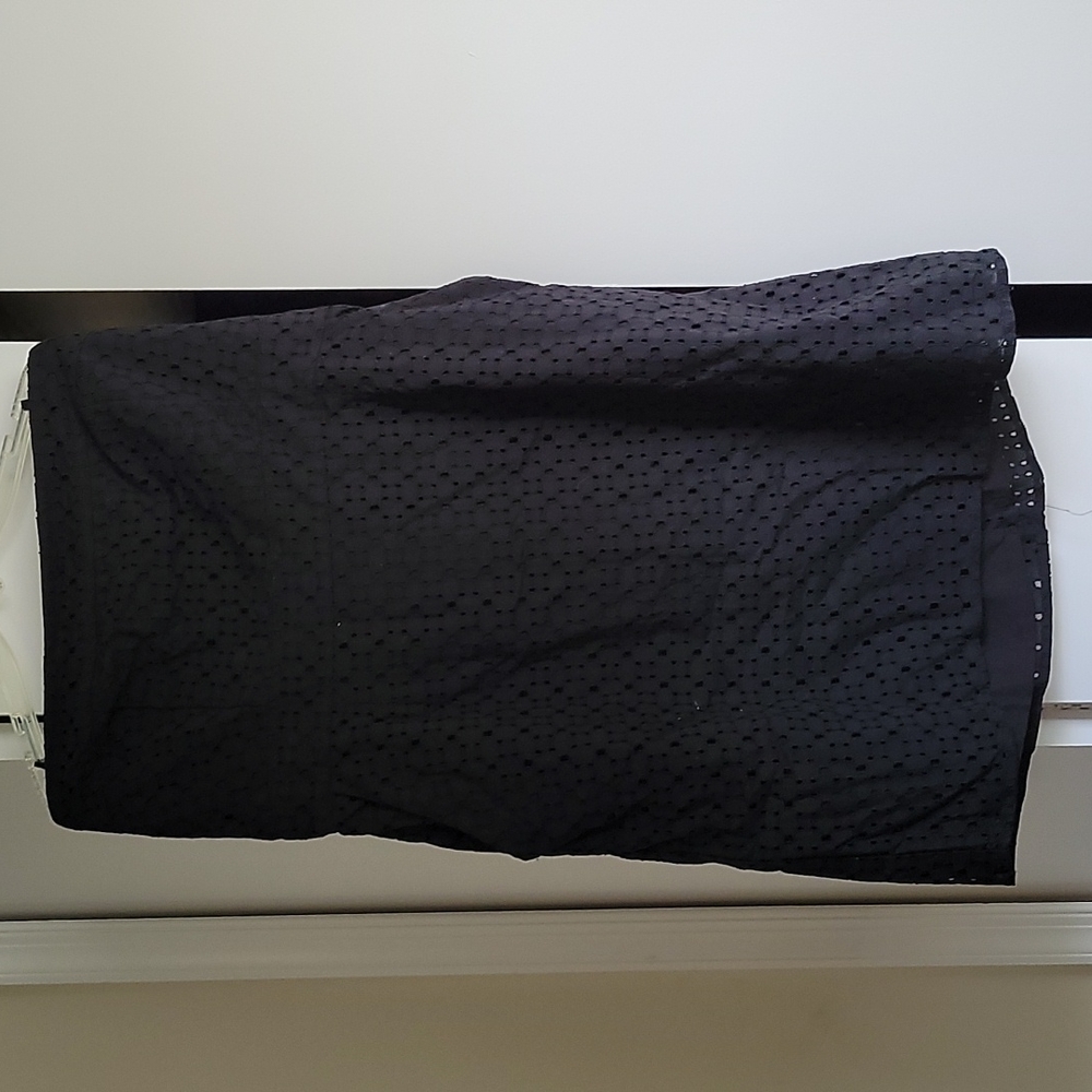 Strapless little black dress with pockets